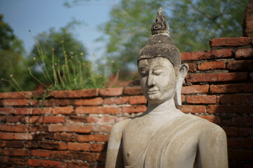 Limestone Buddhist state at Wat Yai Chai Mongkhon, Ayutthaya Thailand.
