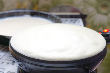 big round pancake on electric frying pan