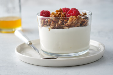 Diet dessert with yogurt, granola and fresh berries.