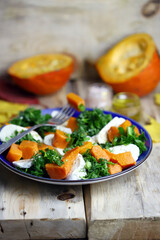 Autumn pumpkin salad with mozzarella. Healthy food. Autumn mood.