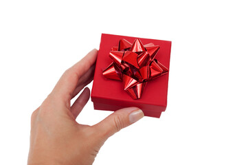 red gift box in hand on white background