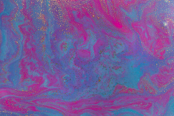 Blue and pink bright wave pattern with layers of gold sequins.