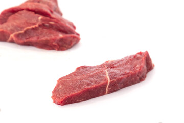 Fresh raw beef steak isolated on white background. Close up raw meat beef.