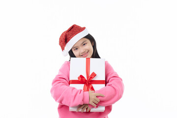 Asian Child hugging Christmas gift box in hand