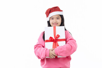 Asian Child hugging Christmas gift box in hand