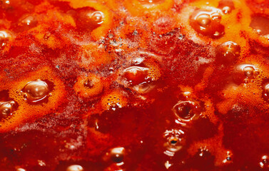 background of boiling tomato sauce