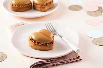 Heart shape vanilla tart with nuts. Valentine's Day.