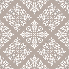 Classic seamless vector pattern. Damask orient brown and white ornament. Classic vintage background. Orient ornament for fabric, wallpaper and packaging