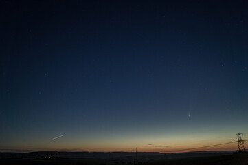 comet and night sky and clouds