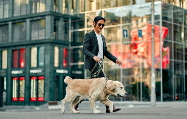 Man with dog in the city