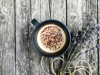 cup of coffee with a bouquet of lavender