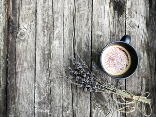 cup of coffee with a bouquet of lavender
