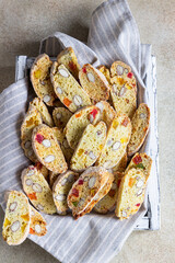 Traditional Italian cookies biscotti, cantucci or cantuccini with almond and dry fruits.