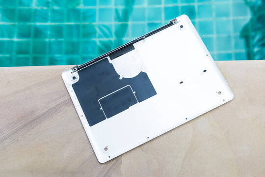 Computer laptop cover on swimming pool edge, computer part, repare service, computer design