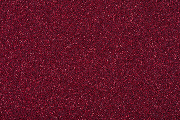 Glitter texture, beautiful saturated red wallpaper for Christmas design.
