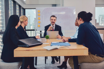 Businesspeople meeting in office teamwork discussing marketing project