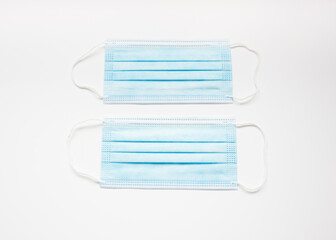 Medical protective mask on white background, top view. Health care