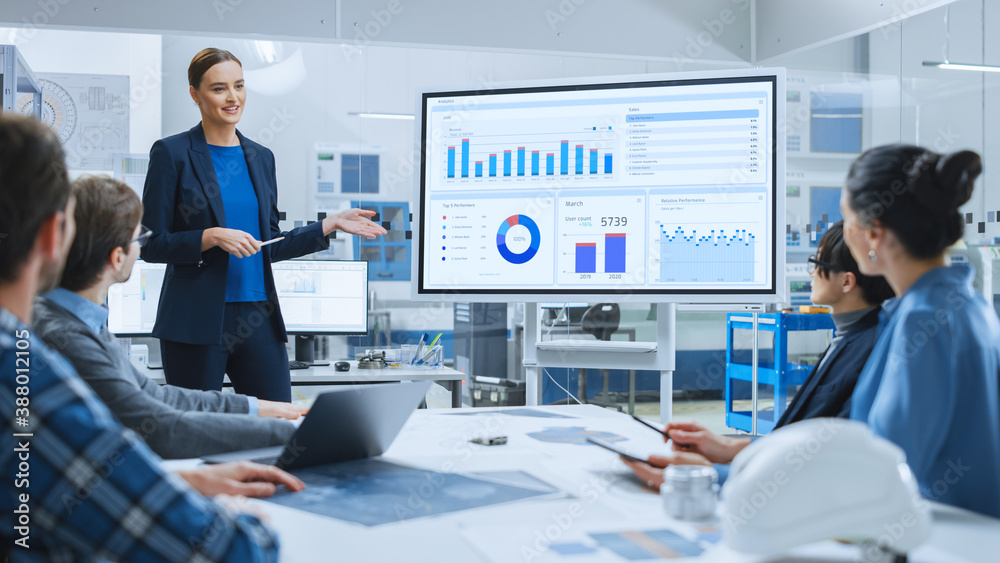 Poster modern industrial factory meeting: confident female engineer uses interactive whiteboard, makes repo