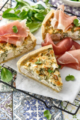 Homemade Cheesy Egg Quiche for Brunch with Spinach and jamon.