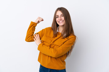 Young woman over isolated white background doing strong gesture