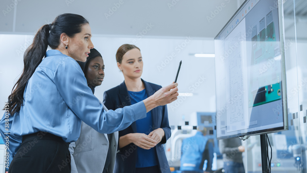 Aufkleber All-Female Team: Concept Developer, Computer Engineer and Manager Use Digital Interactive Whiteboard That Shows 3D Printed Circuit Board Concept. Developers Find Problem Solution. Factory Meeting Room