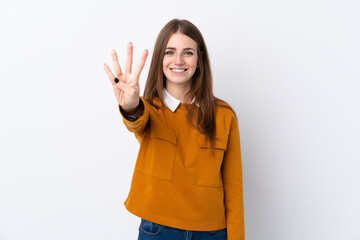 Young woman over isolated white background happy and counting four with fingers