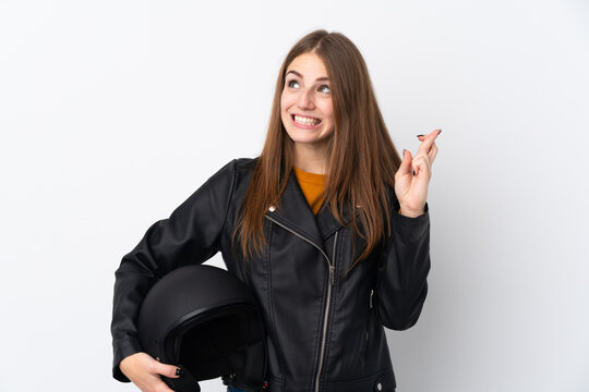 Woman with a motorcycle helmet with fingers crossing
