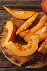 Fresh ripe pumpkin on a wooden table  