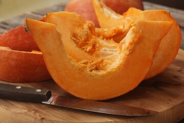 Fresh ripe pumpkin on a wooden table  