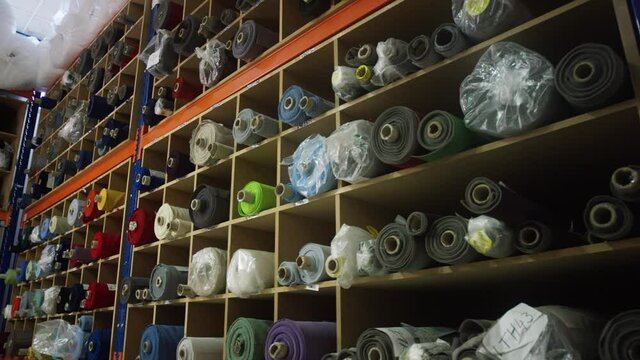 Stock of cloth rolls in warehouse 4k PRORES Footage
