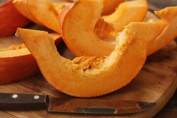 Fresh ripe pumpkin on a wooden table  