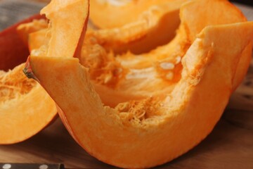 Fresh ripe pumpkin on a wooden table  