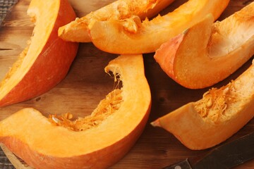 Fresh ripe pumpkin on a wooden table  