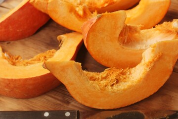 Fresh ripe pumpkin on a wooden table  