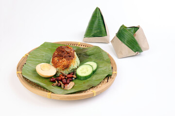 Nasi Lemak fragrant rice cooked in coconut milk served with sambal friend peanut anchovy boiled egg...
