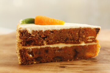 Delicious carrot cake on a wooden table 