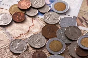 コインと新聞紙