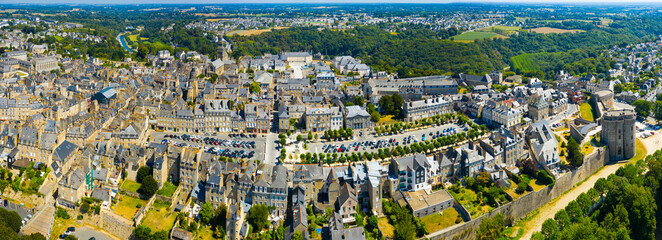 General panoramic view of walled Breton town of Dinan on sunny summer day, France
