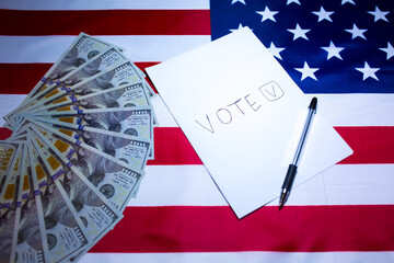 American flag with dollars on it. Elections in the USA. Paper for vote tick. Money as concept of...
