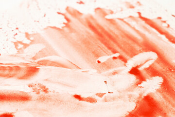 blood on a white surface in the background, closeup