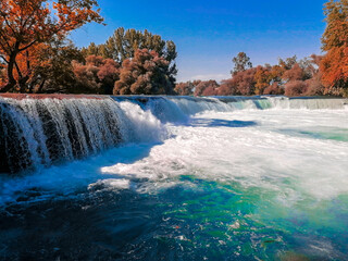 Flowing waterfall landspace. Amazing view of Manavgat waterfall. Summer, spring concept view. 