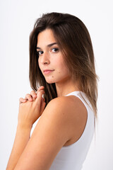 Obraz premium Portrait of pretty teenager Brazilian girl over isolated background