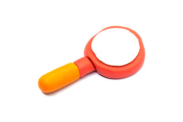 Play dough Magnifying glass on white background. Icon Magnifying glass. Handmade clay plasticine