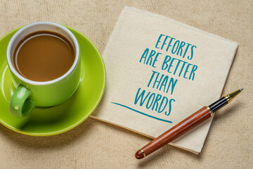 efforts are better  inspirational handwriting on a napkin with a cup of coffee, business, education and personal development concept