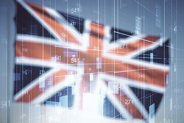 Abstract virtual stats data hologram on flag of Great Britain and sunset sky background. Multiexposure