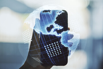 Double exposure of digital America map and hand with cell phone on background, research and strategy concept