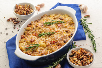 Baked cauliflower with bacon, cheese, nuts, spices and fresh herbs.