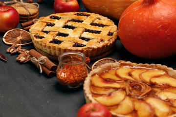 Berry tart pie and apple tart pie on black background
