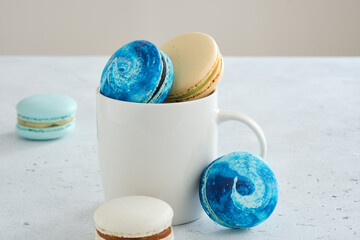 Homemade Colorful macaroons or macaron on White background.