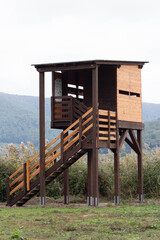 Fototapeta na wymiar Bird Watching tower of the Lake Vico Natural Reserve.That is One of the best bird watching stations around the lake via.The tower building for Bird watcher and natural lovers.Viterbo , Italy .